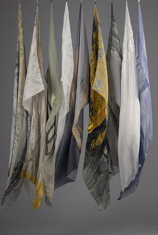 All samples hung by their top corner, blowing in a light breeze