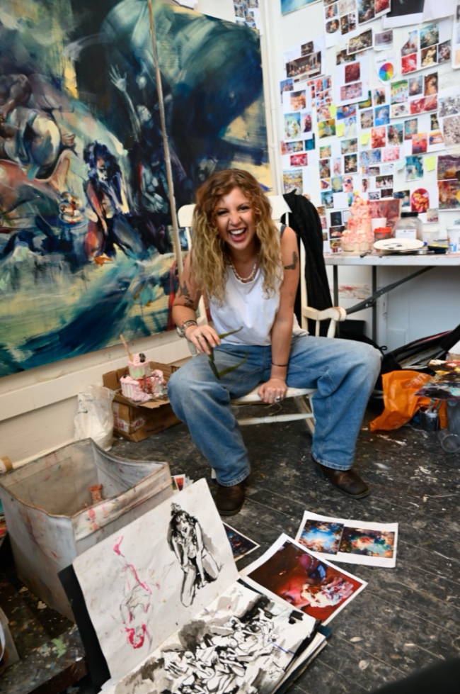 Me sat in my studio full of images