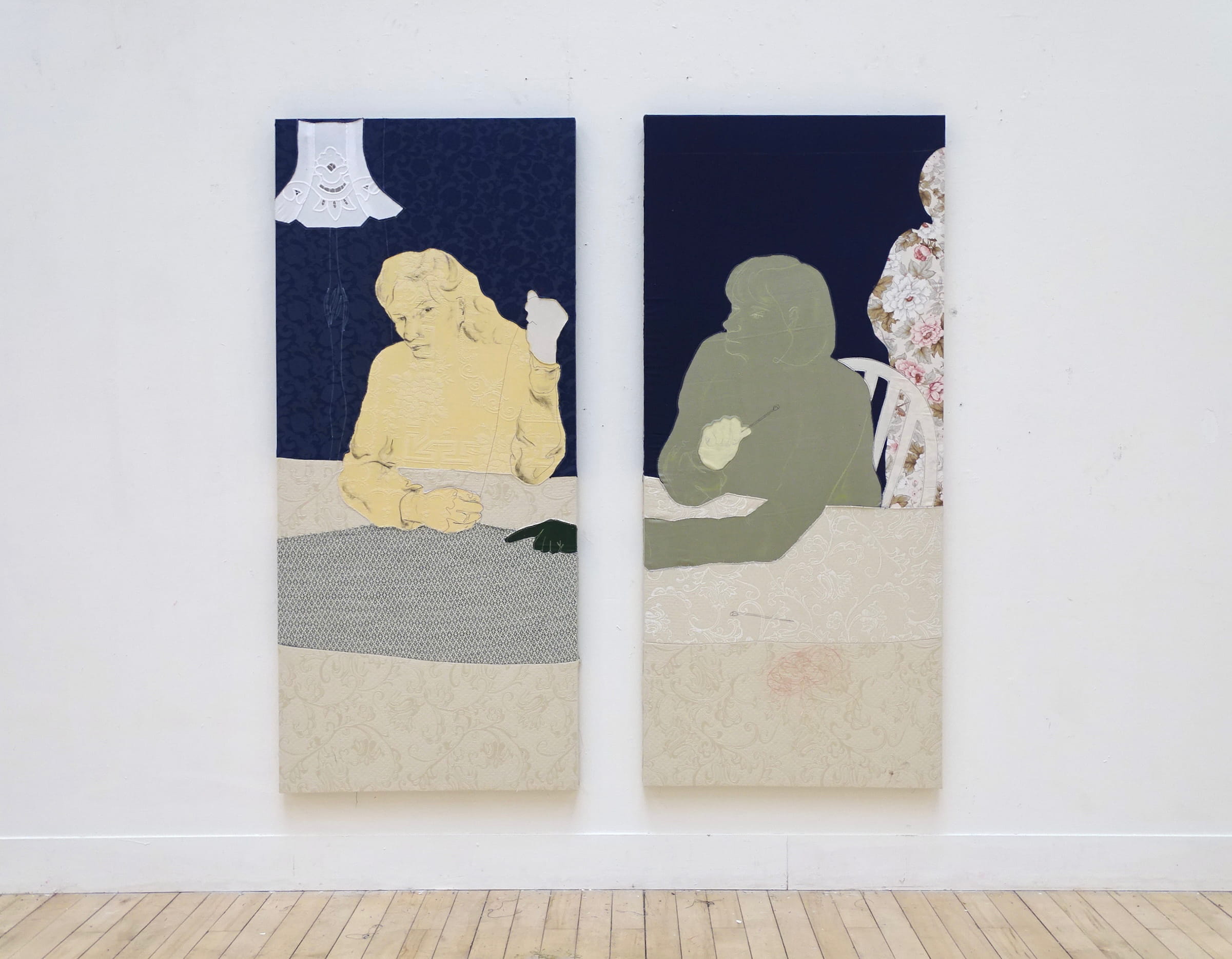 Two hung panels of Draught screen ‘Labour of Love’ on walls of Sculpture Court, ECA. 