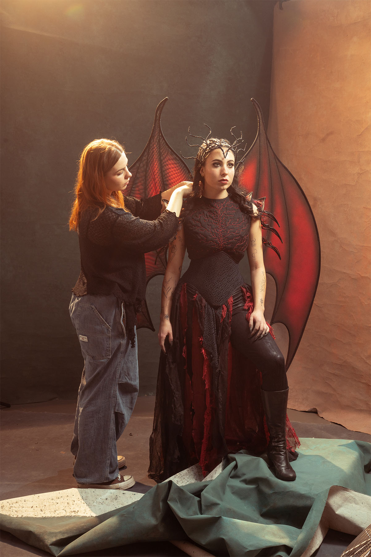 The costume designer makes tweaks on her costume for Throne of Glass