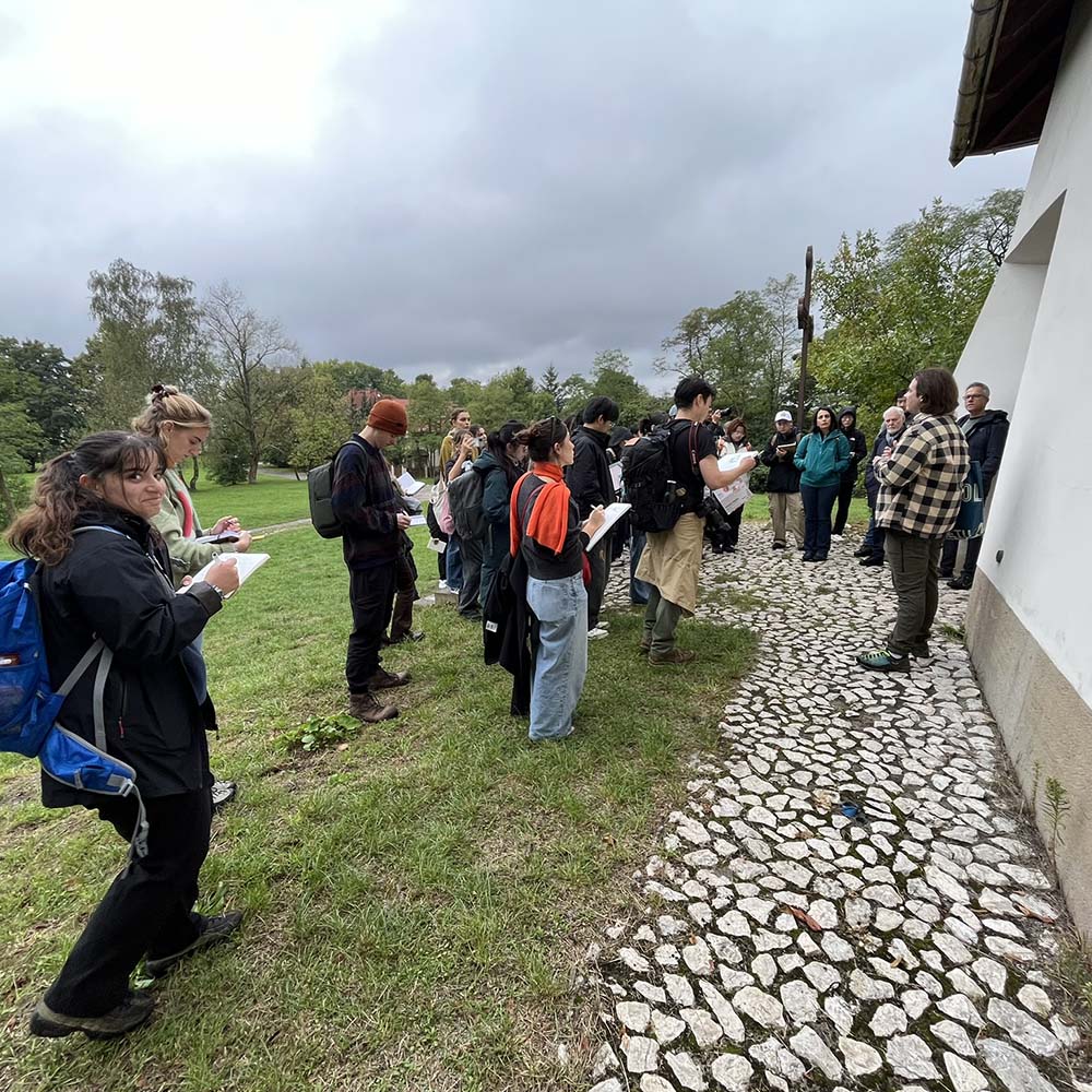 Krakow students on the Krezemionki site listening to Dr Kamil Karski, Collection Manager of the KL Plaszow Museum, talk about the Benedykta w Podgórzu Catholic Church