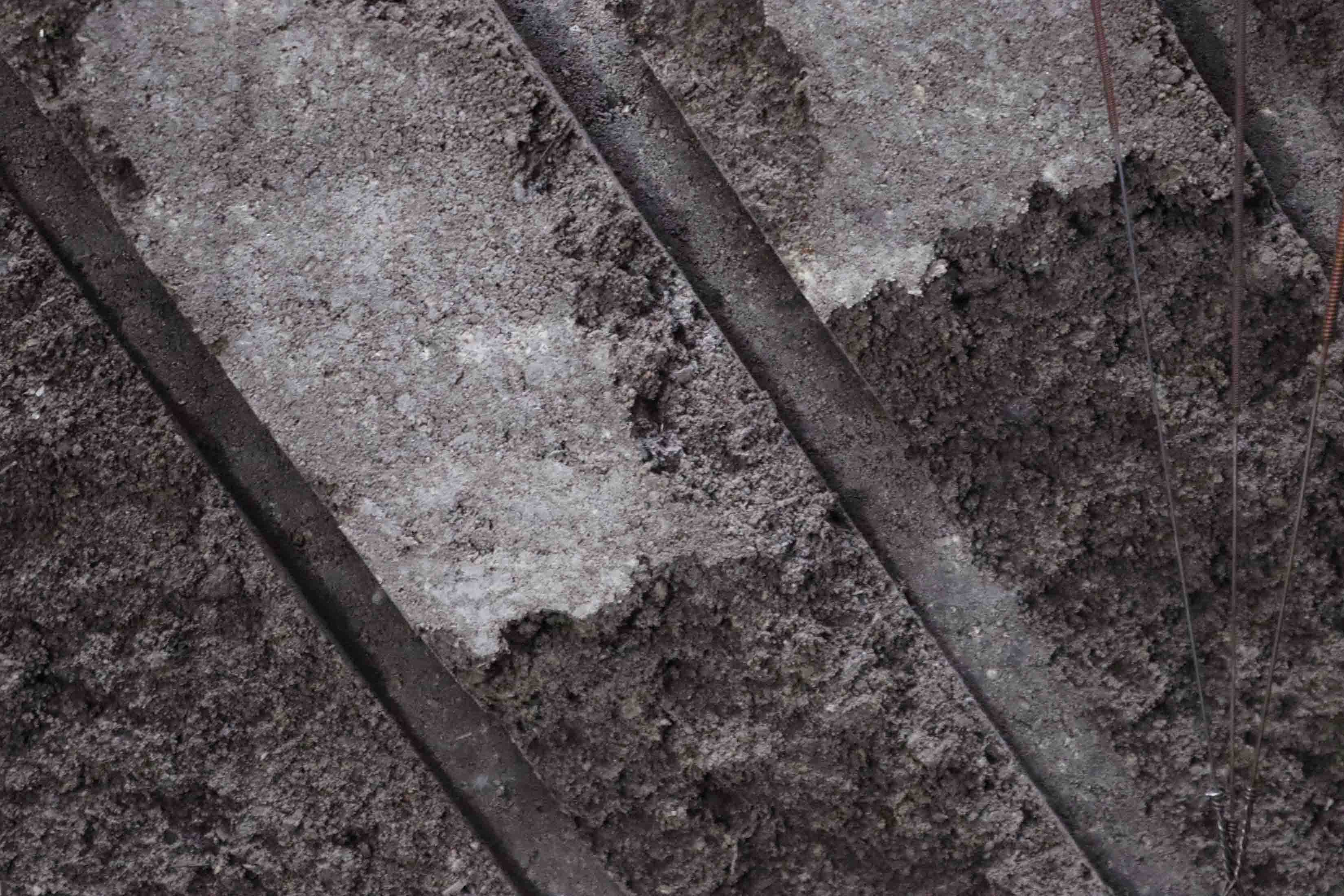 Texture of rammed earth base