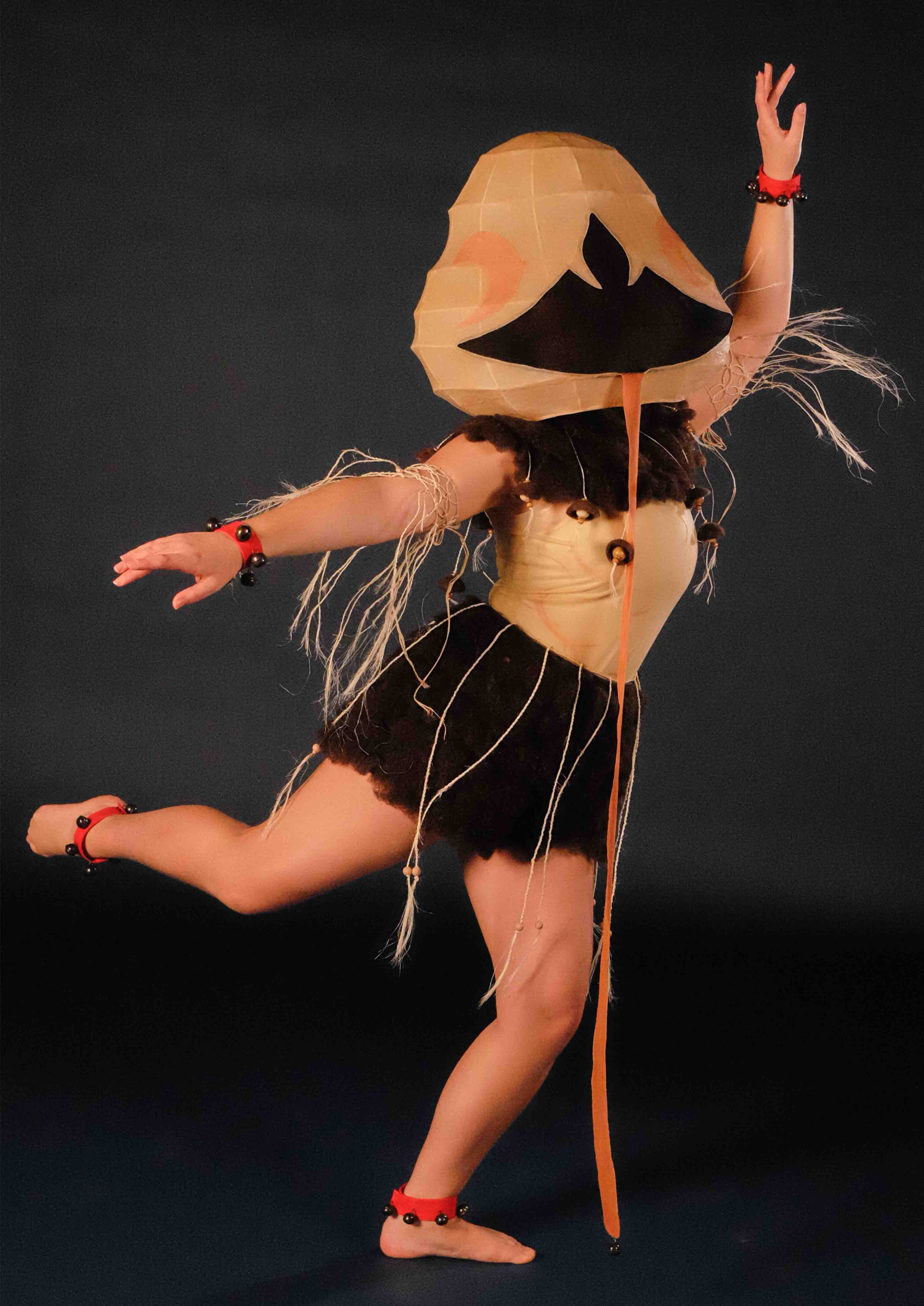 Performer wearing demon costume