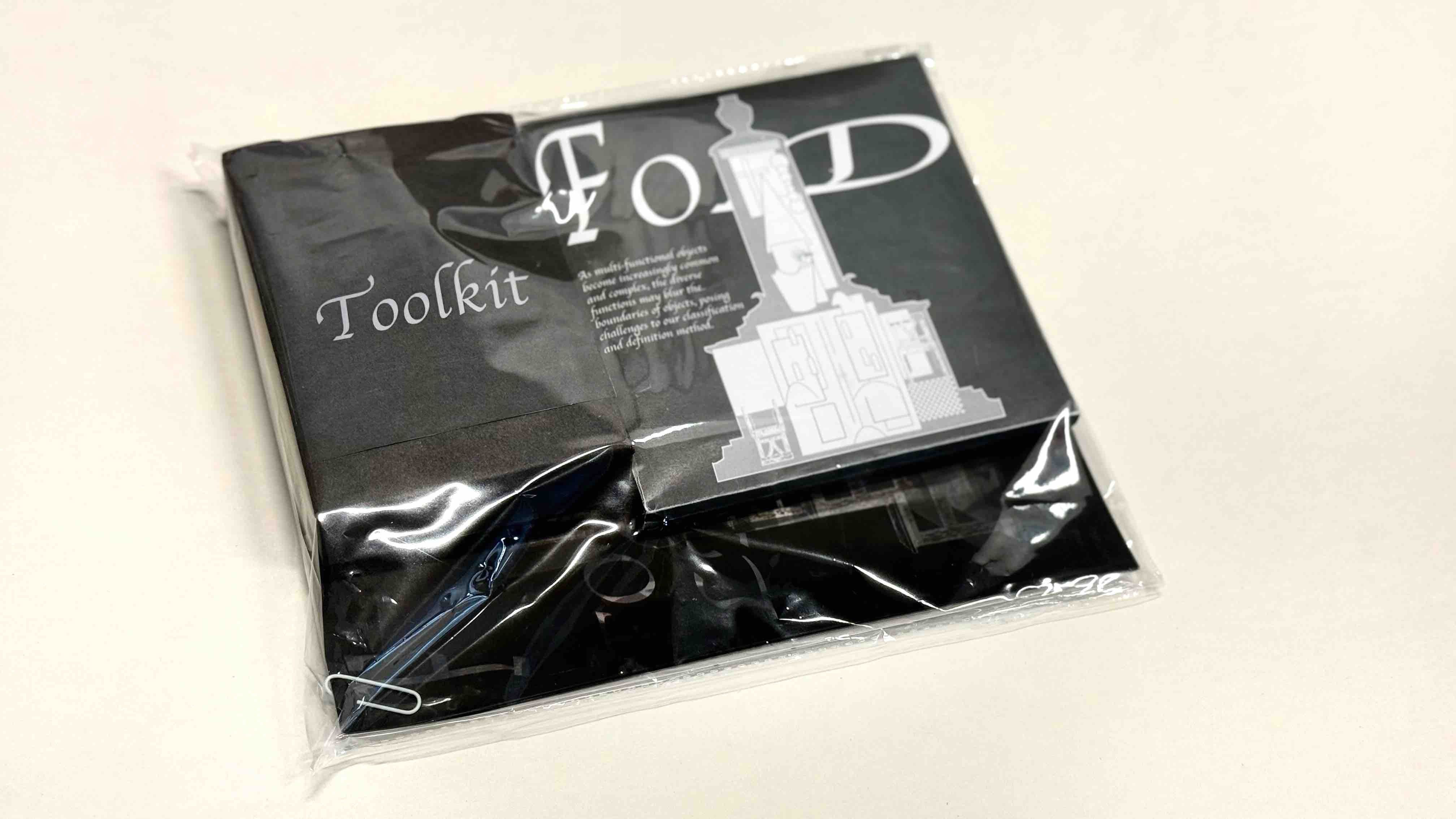 The project is organised as a main file box containing an instruction card, a set of film sheets, a small box of six folded books, and a toolkit box. 