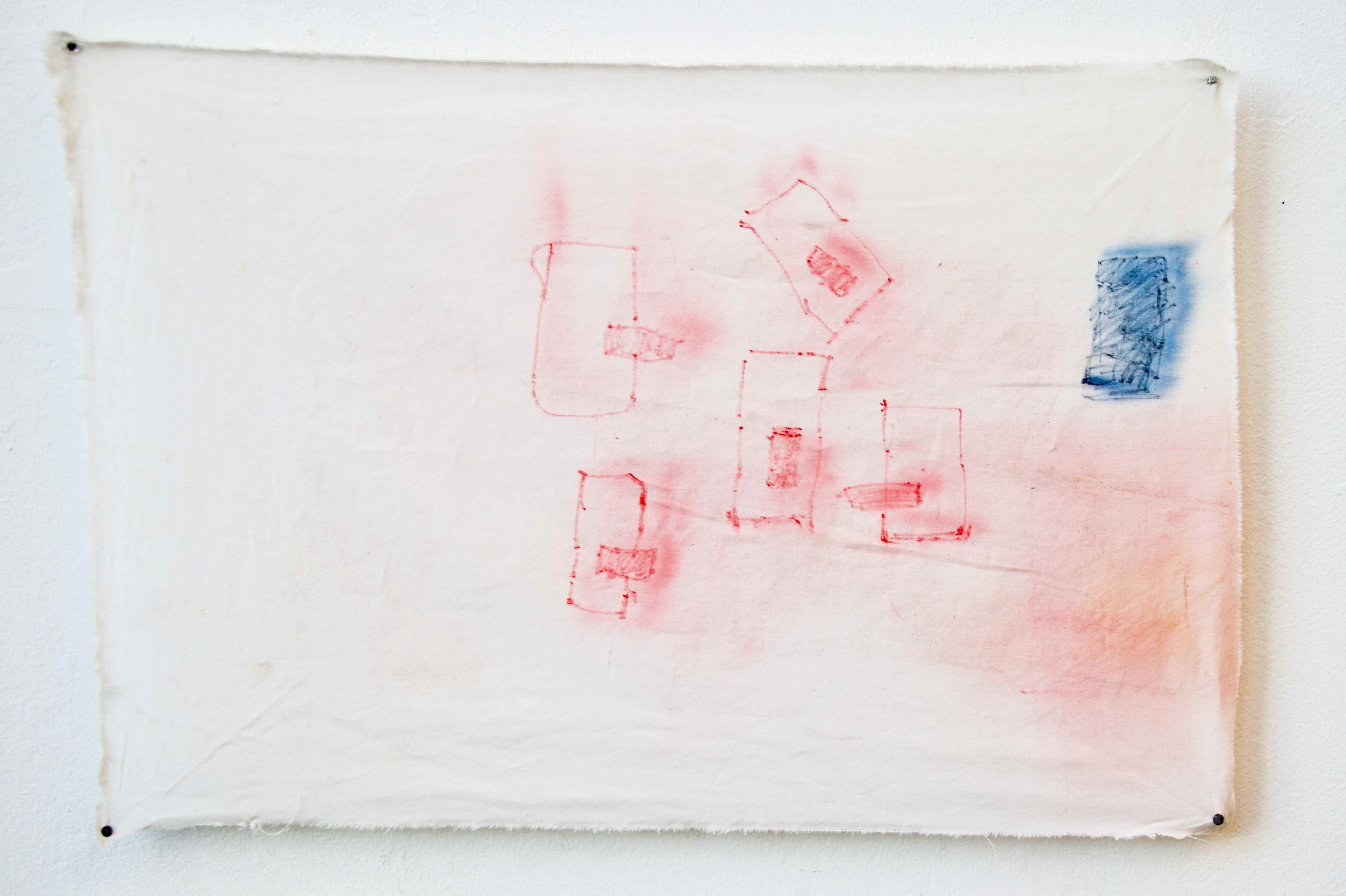Piece of fabric stretched by four nails, drawings of 6 blocks in pencil on it
