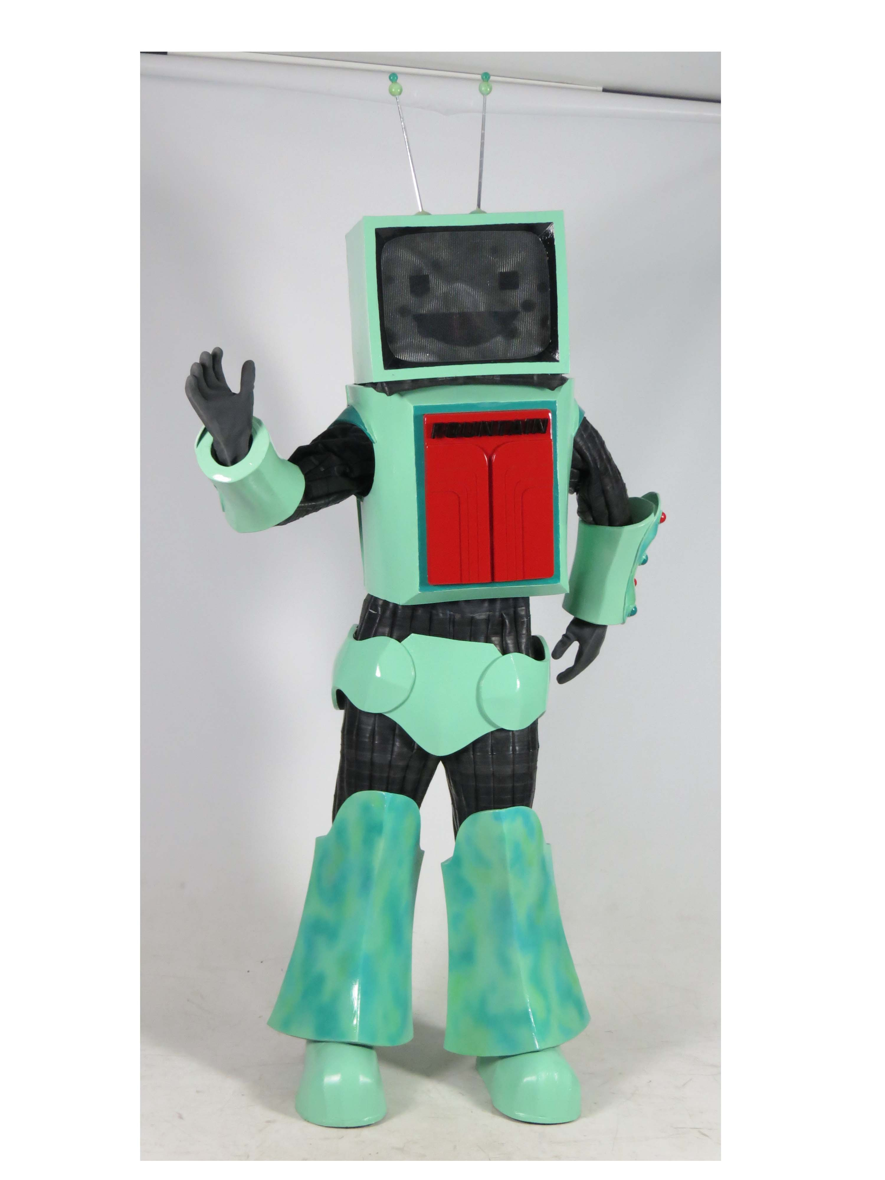 A mint green robot with a television head and red fridge door tummy.