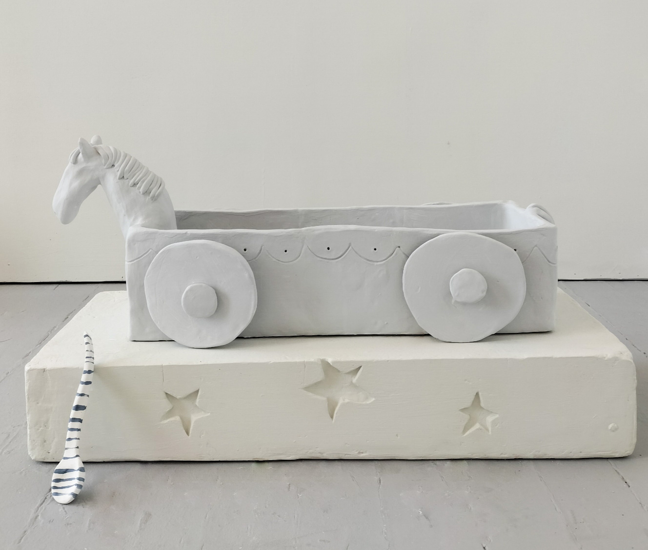 Horse Cart II (2025) Ceramic on plaster