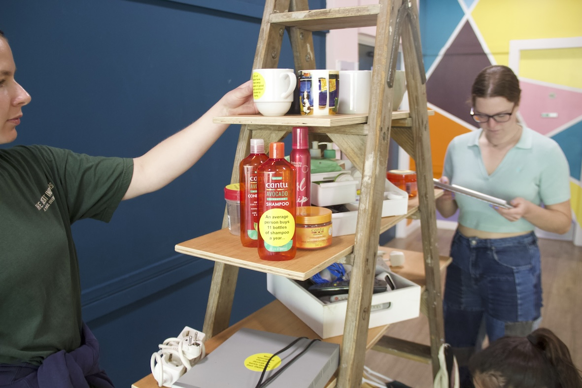 People attending The Museum of Overconsumption
