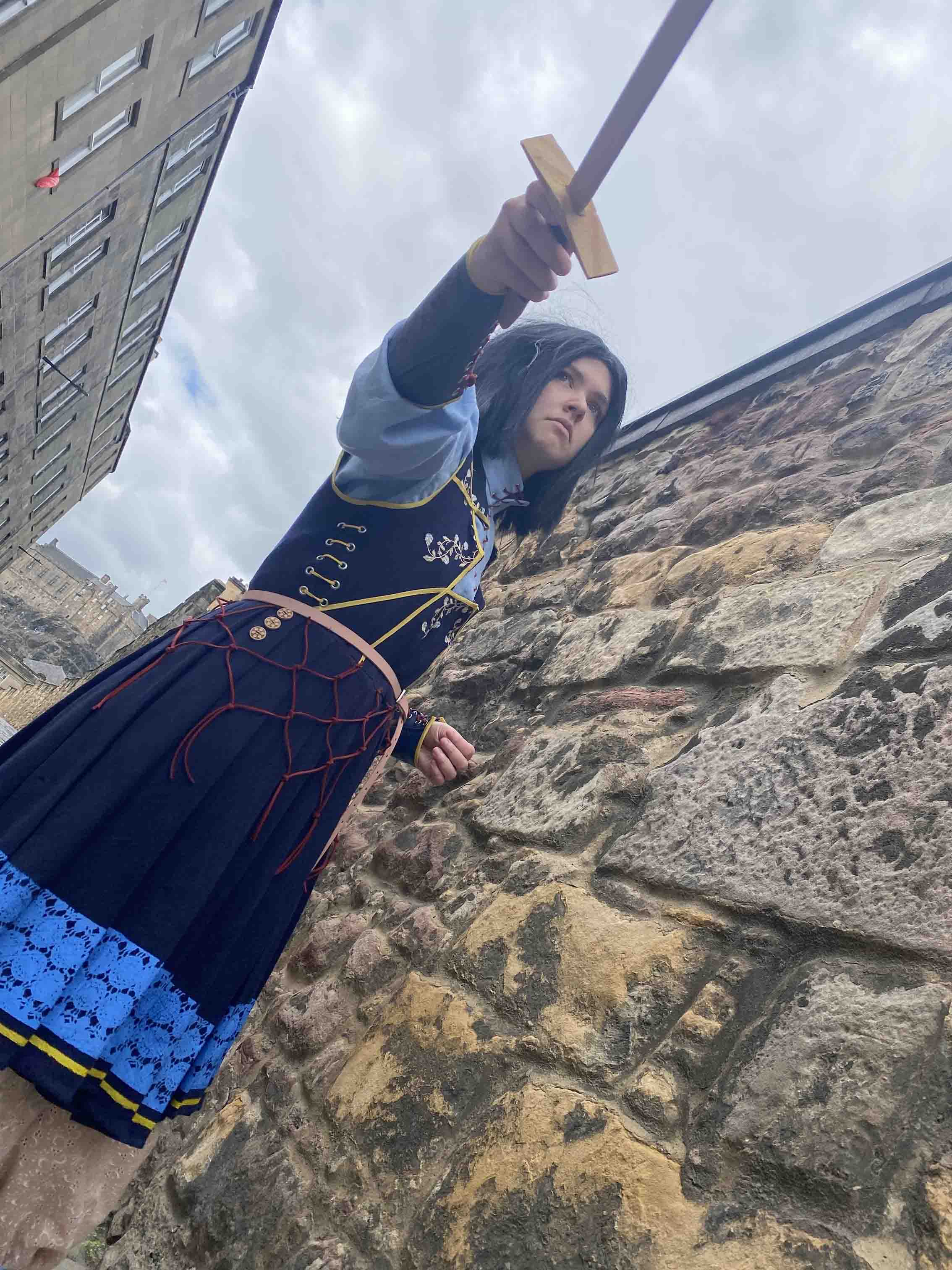 tamir/tobin pointing a sword