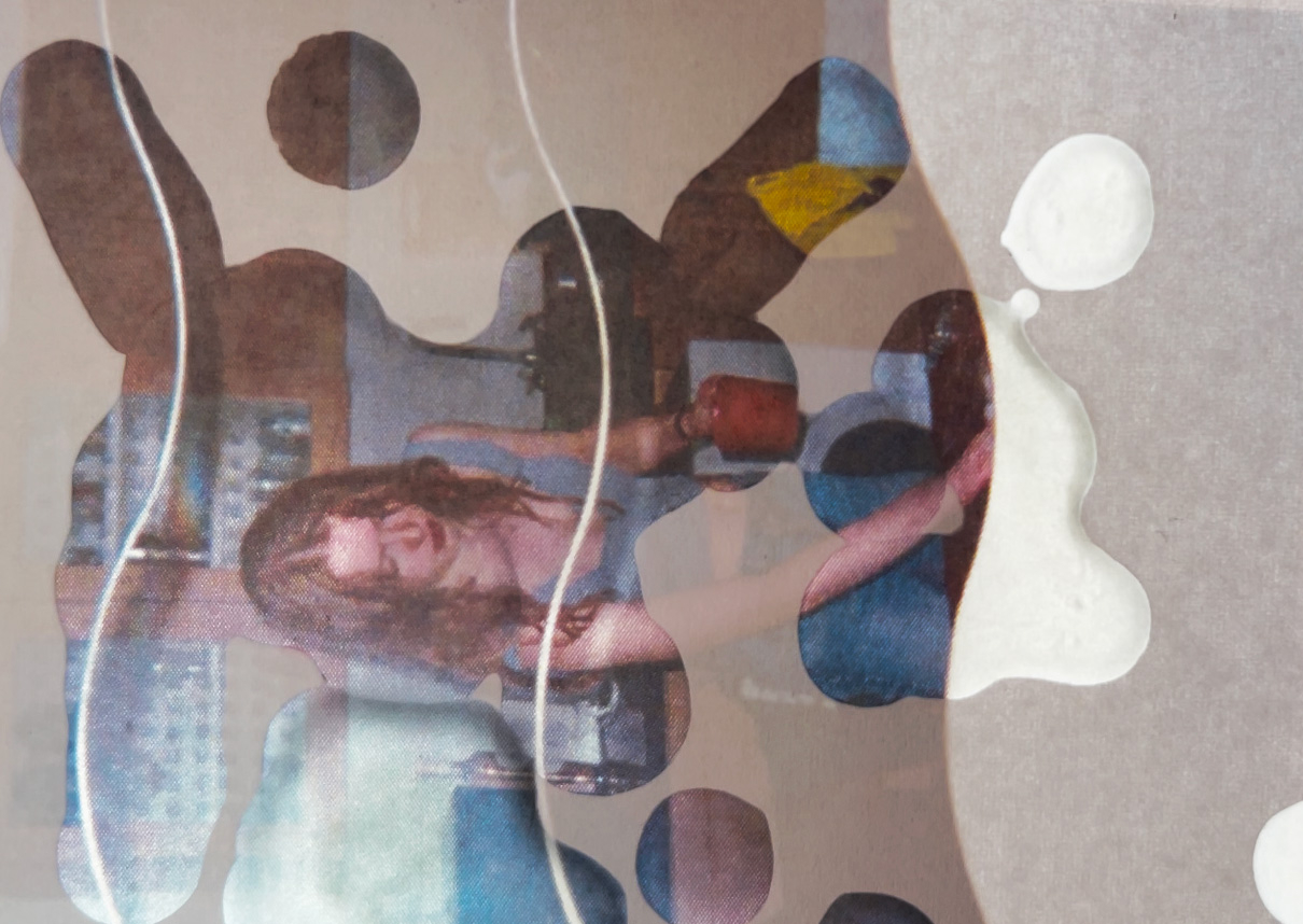 Person looking down in a kitchen.
