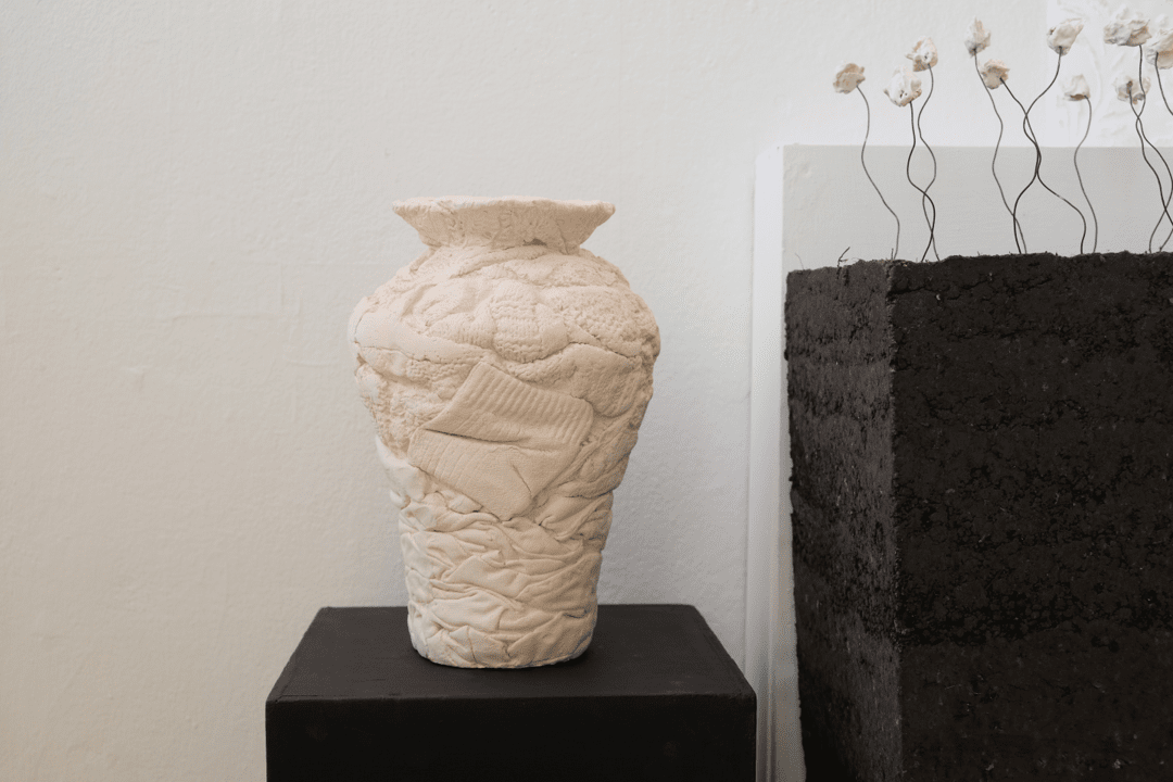 Bisque fired ceramic sculpture.