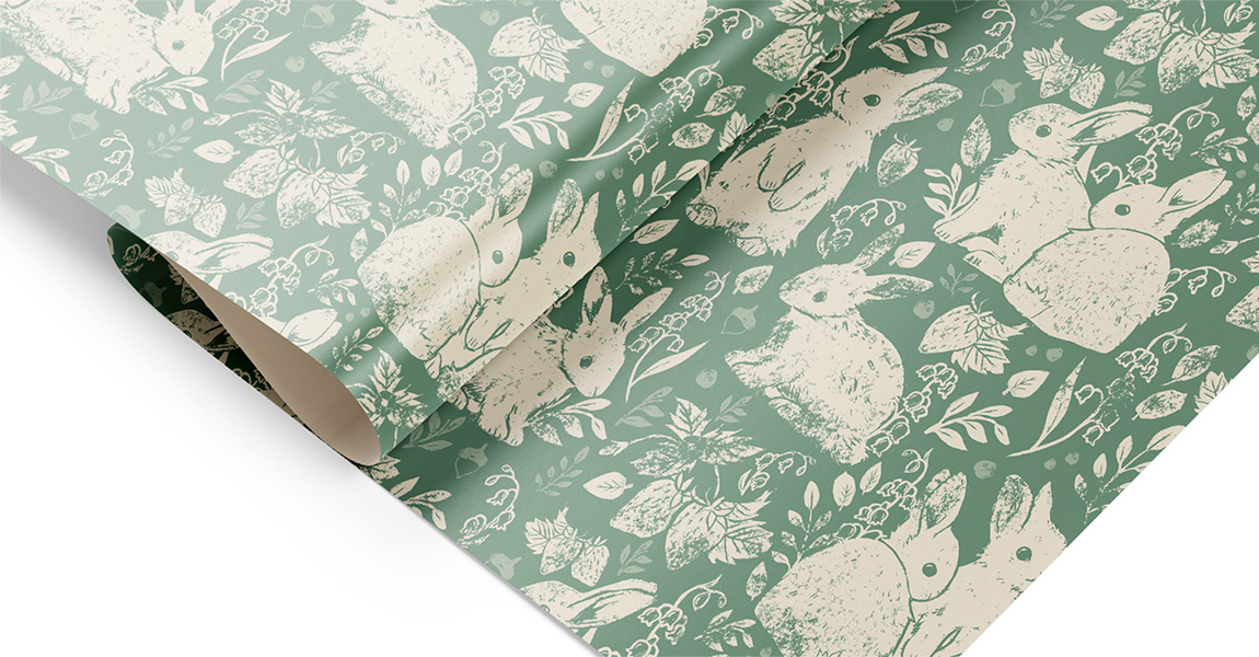 A mockup of a wallpaper consisting of rabbits and floral elements