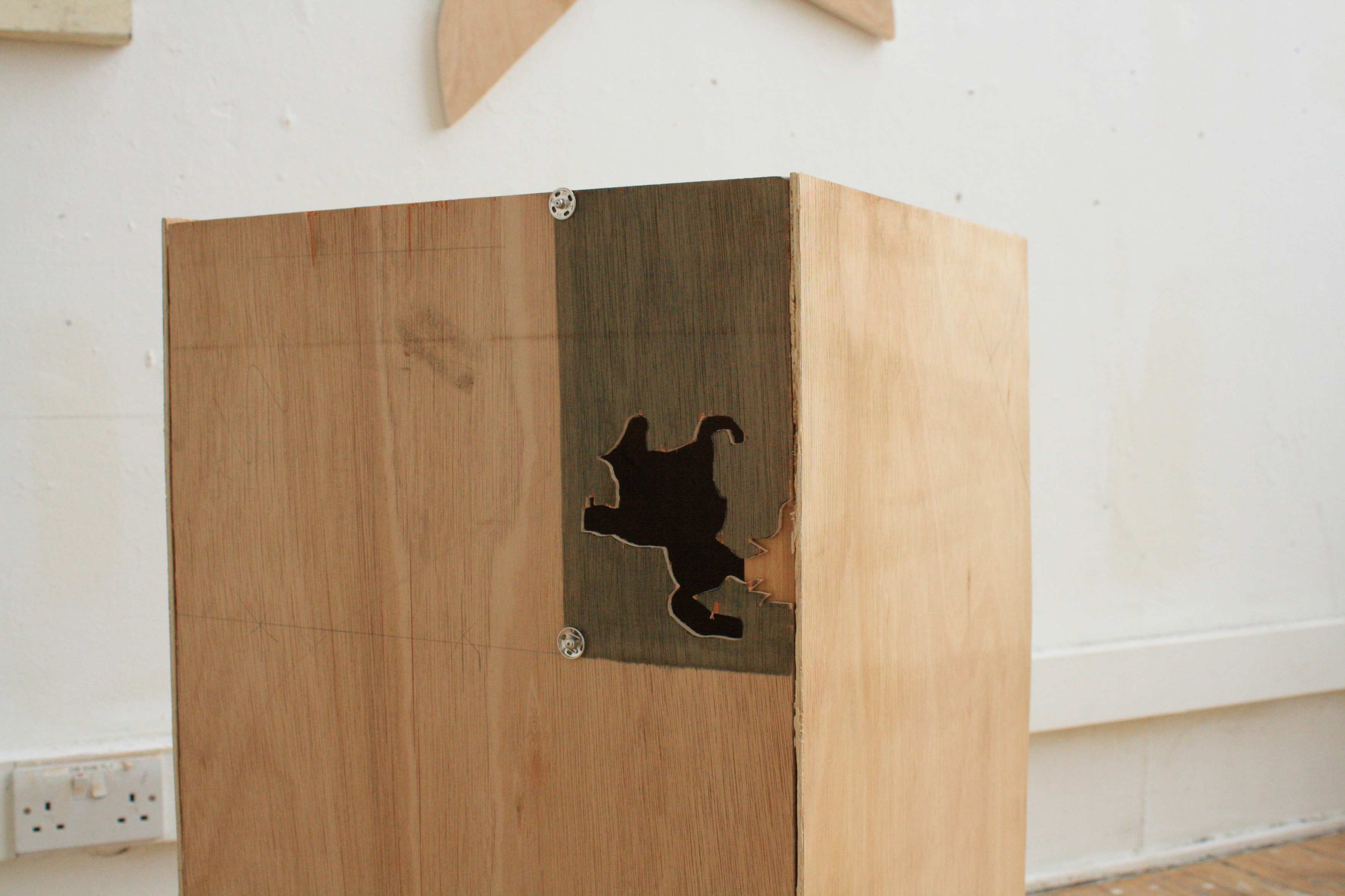 Cowboy carved out of plinth 