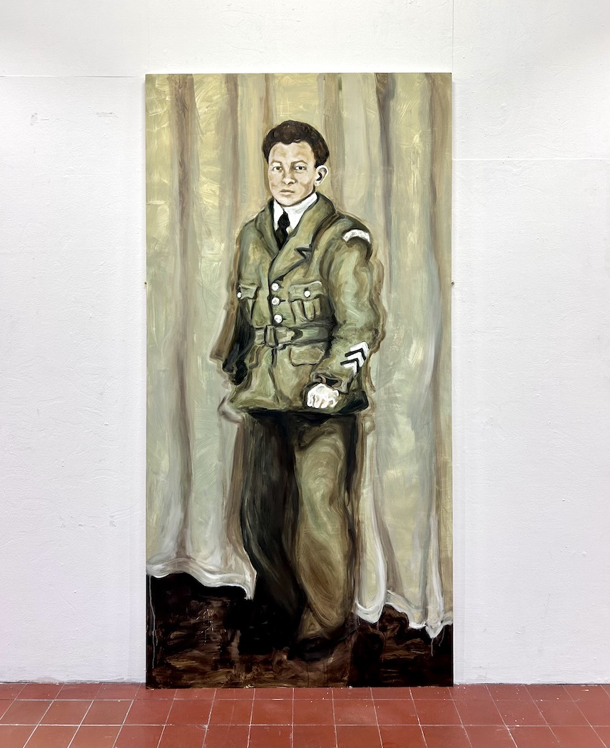 A man stands in an RAF uniform. 