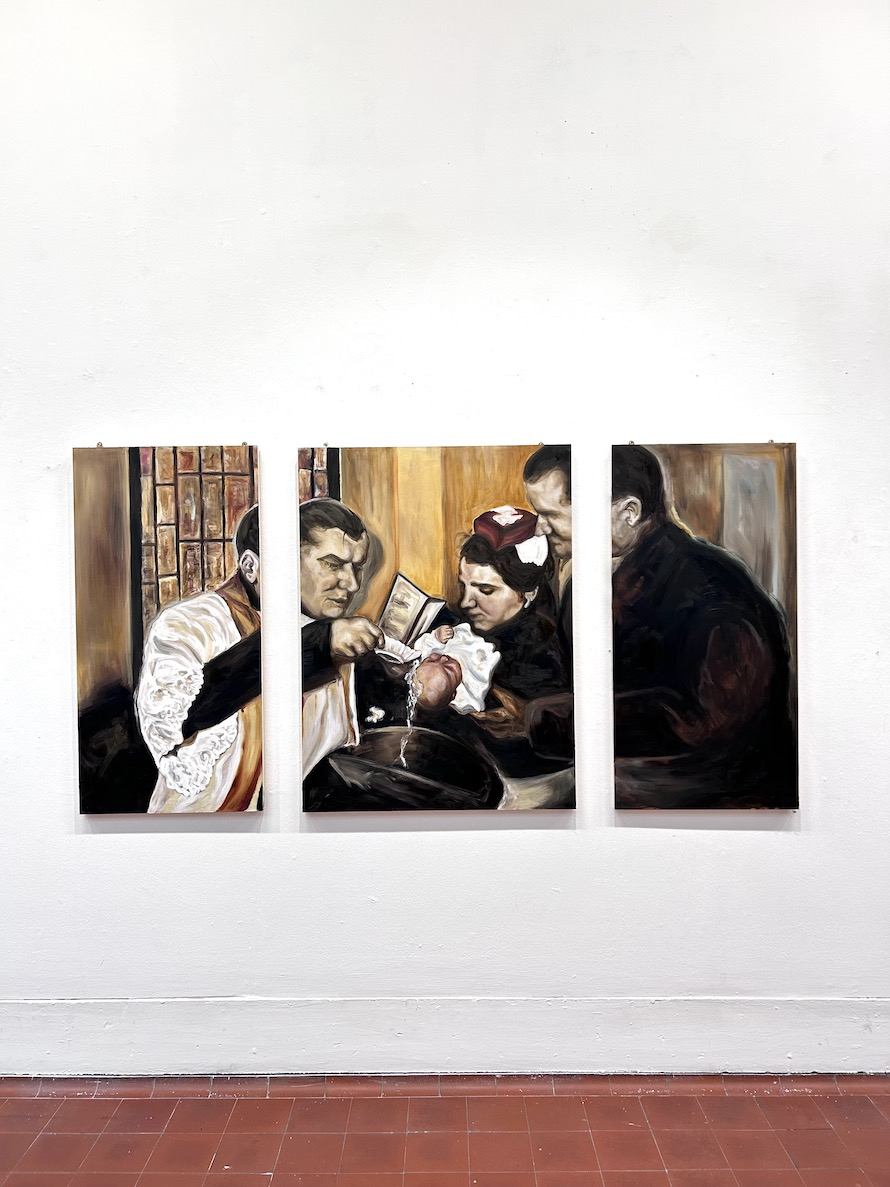 A baptism scene: the priest pours the holy water.