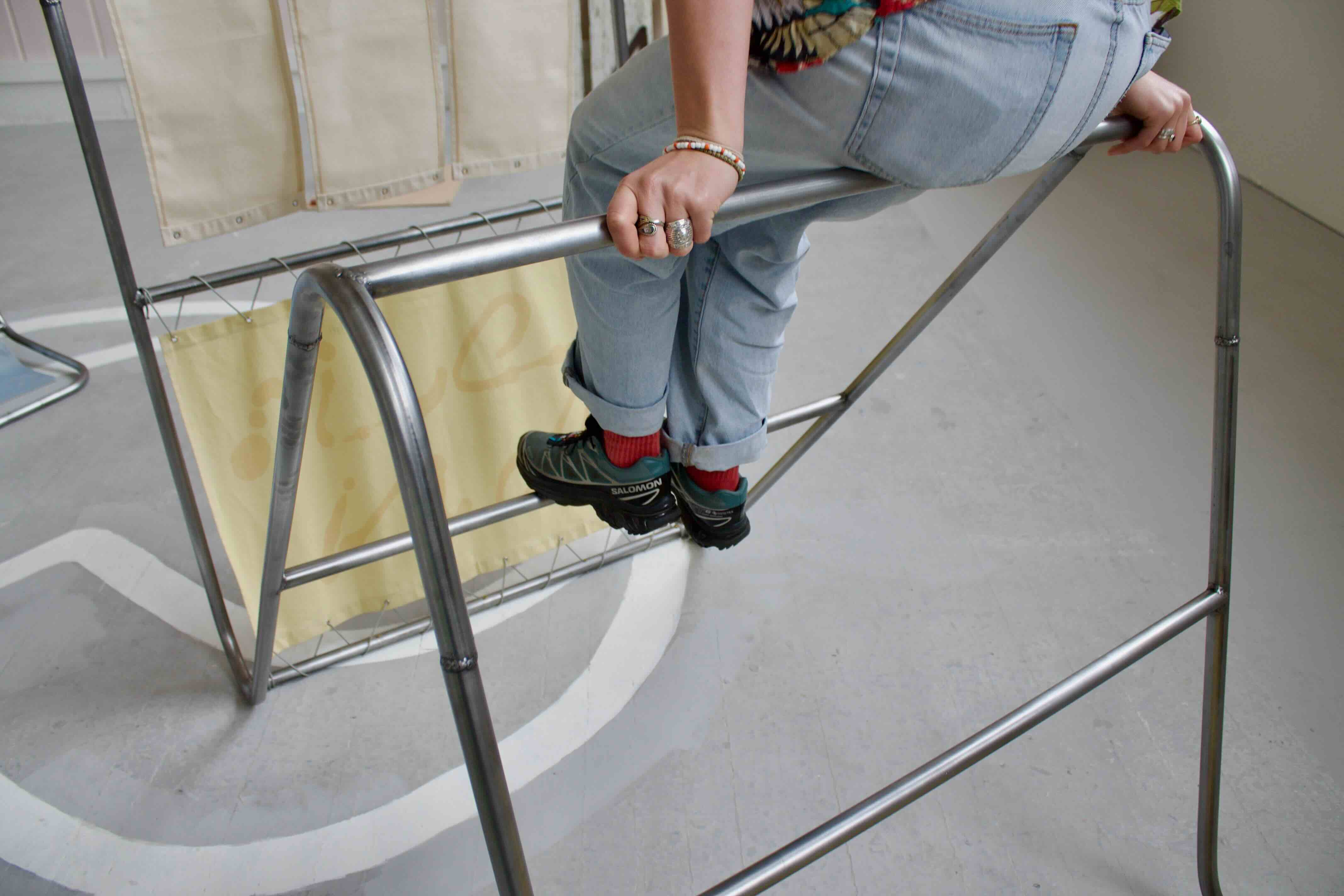 Pictured: figure sat on the top of the 'n frame'