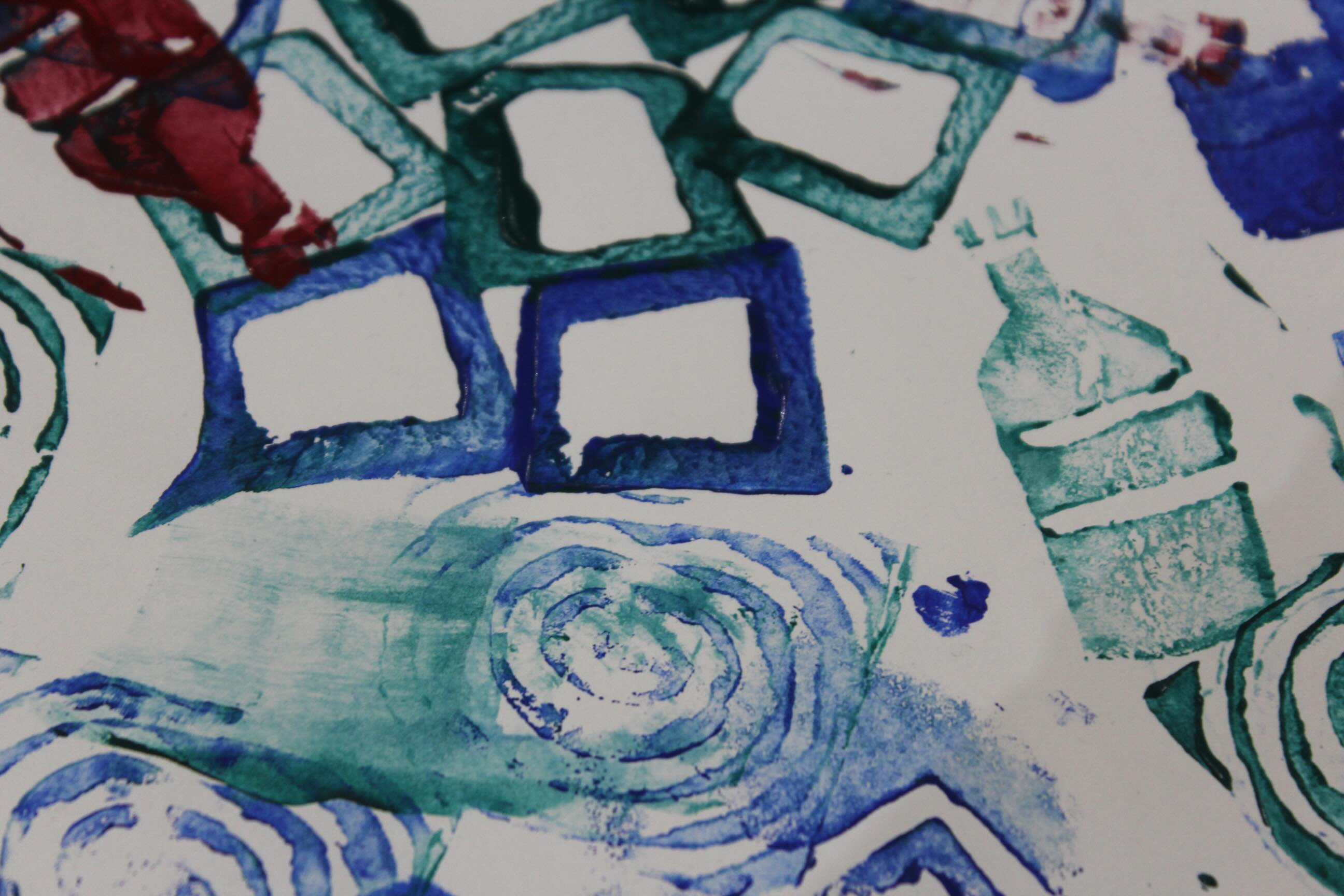 A zoomed in image of multi-coloured prints 