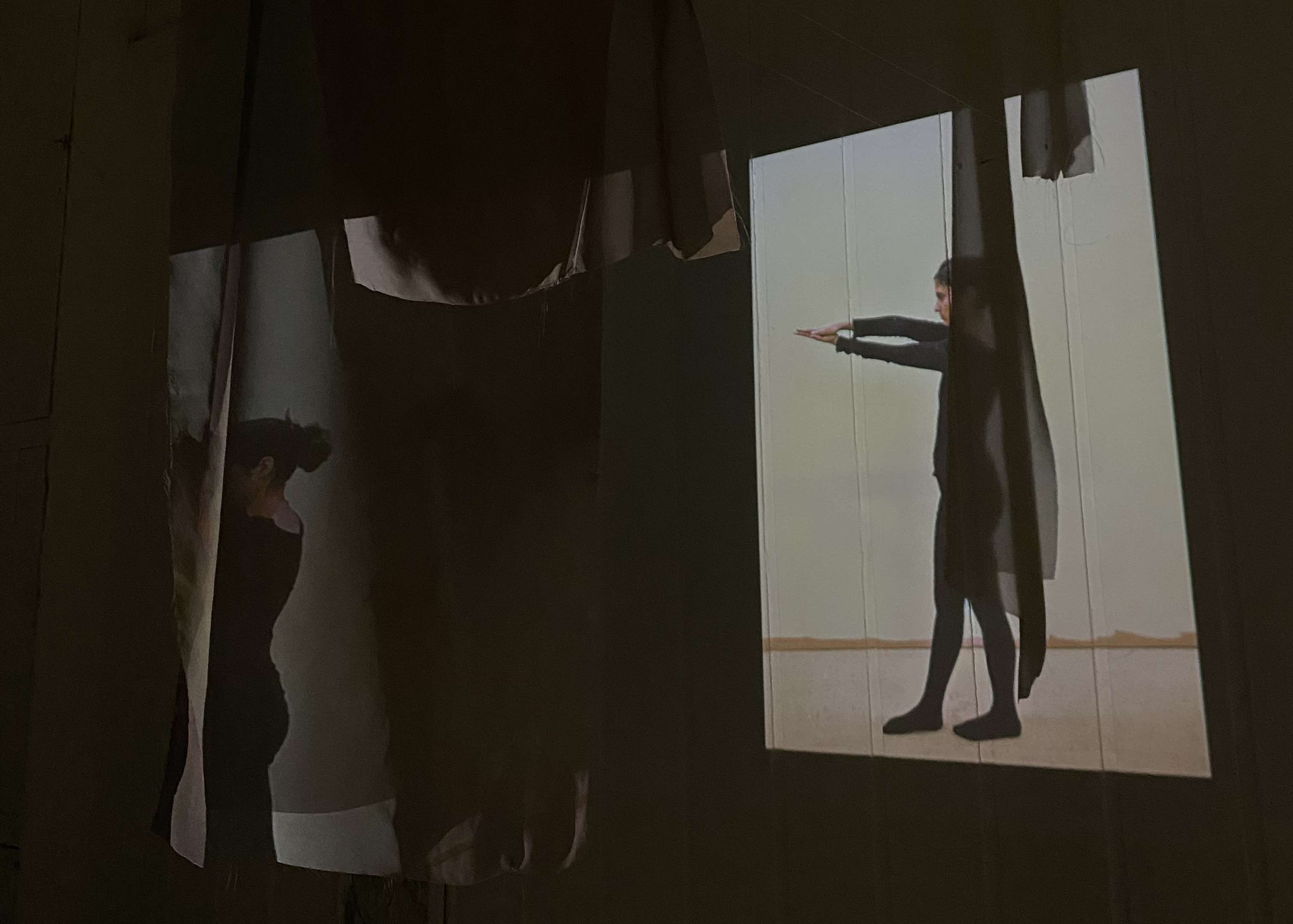 Animation still of body projected over fabric.