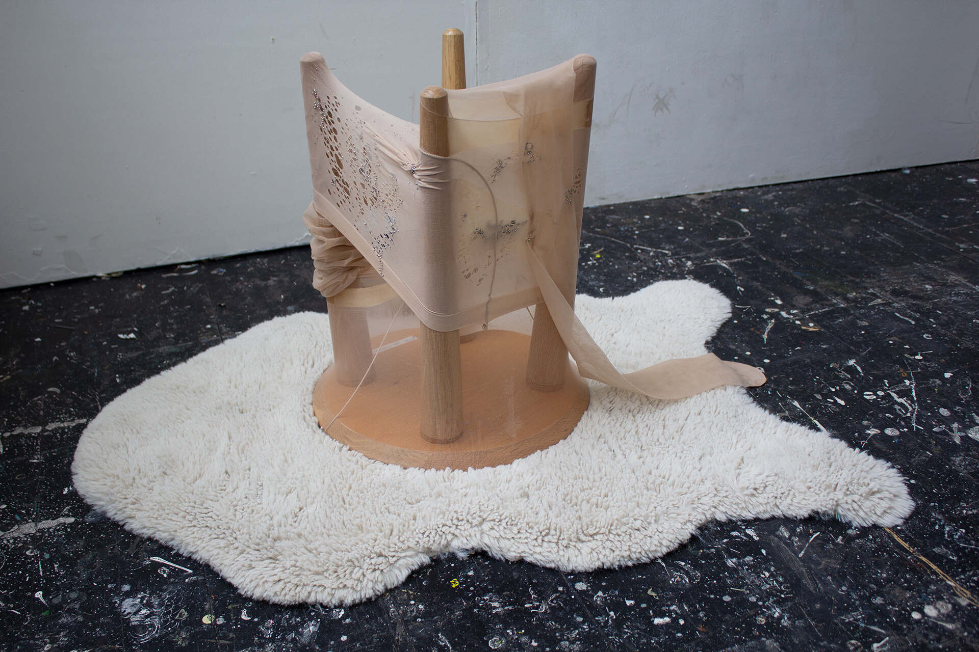 Settle In, 2026 Sculpture, Pins, Latex, Nylon Tights, Wooden Stool 25 x 40cm 