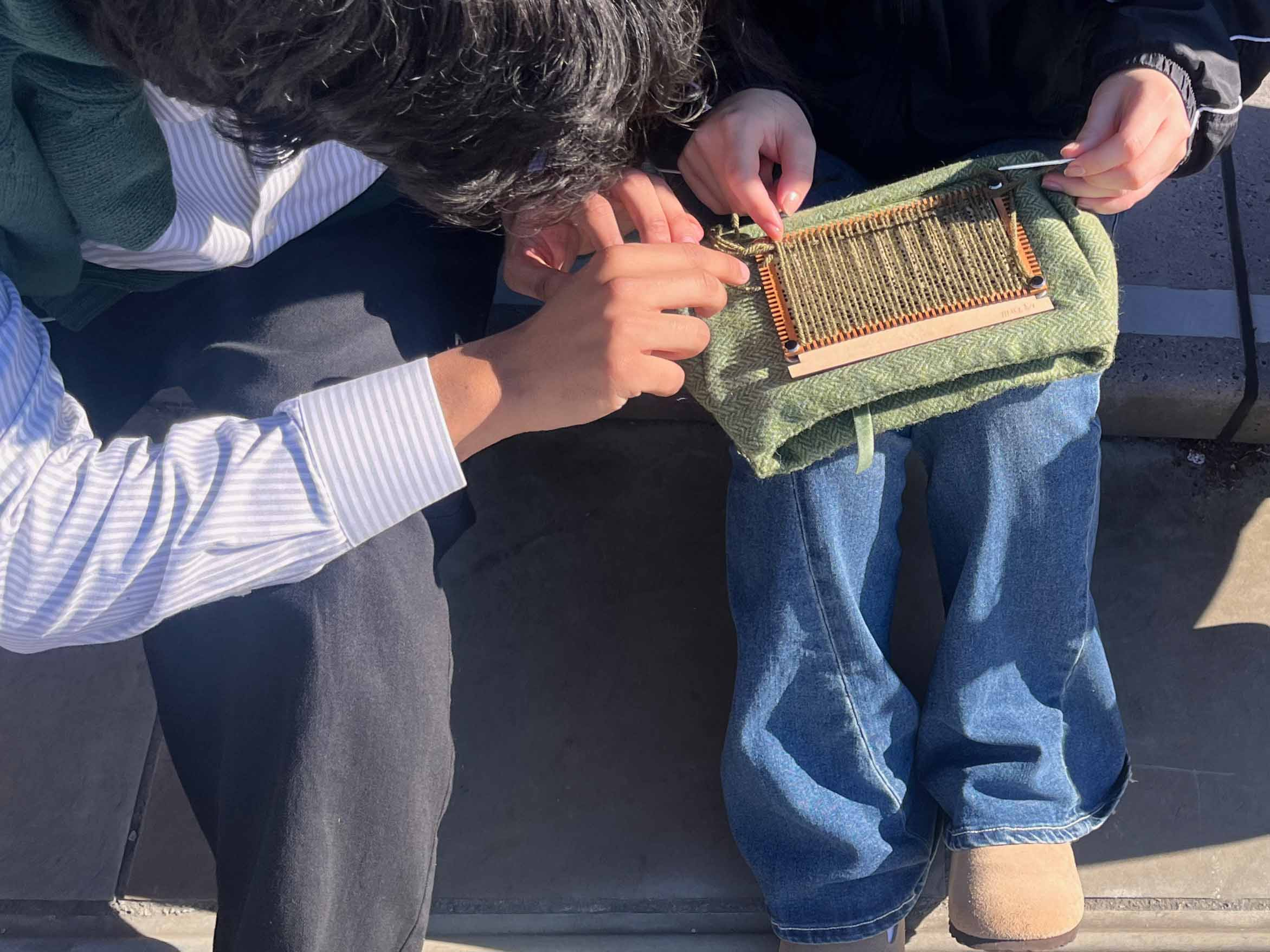 Users learning to weave using LOOM-inate