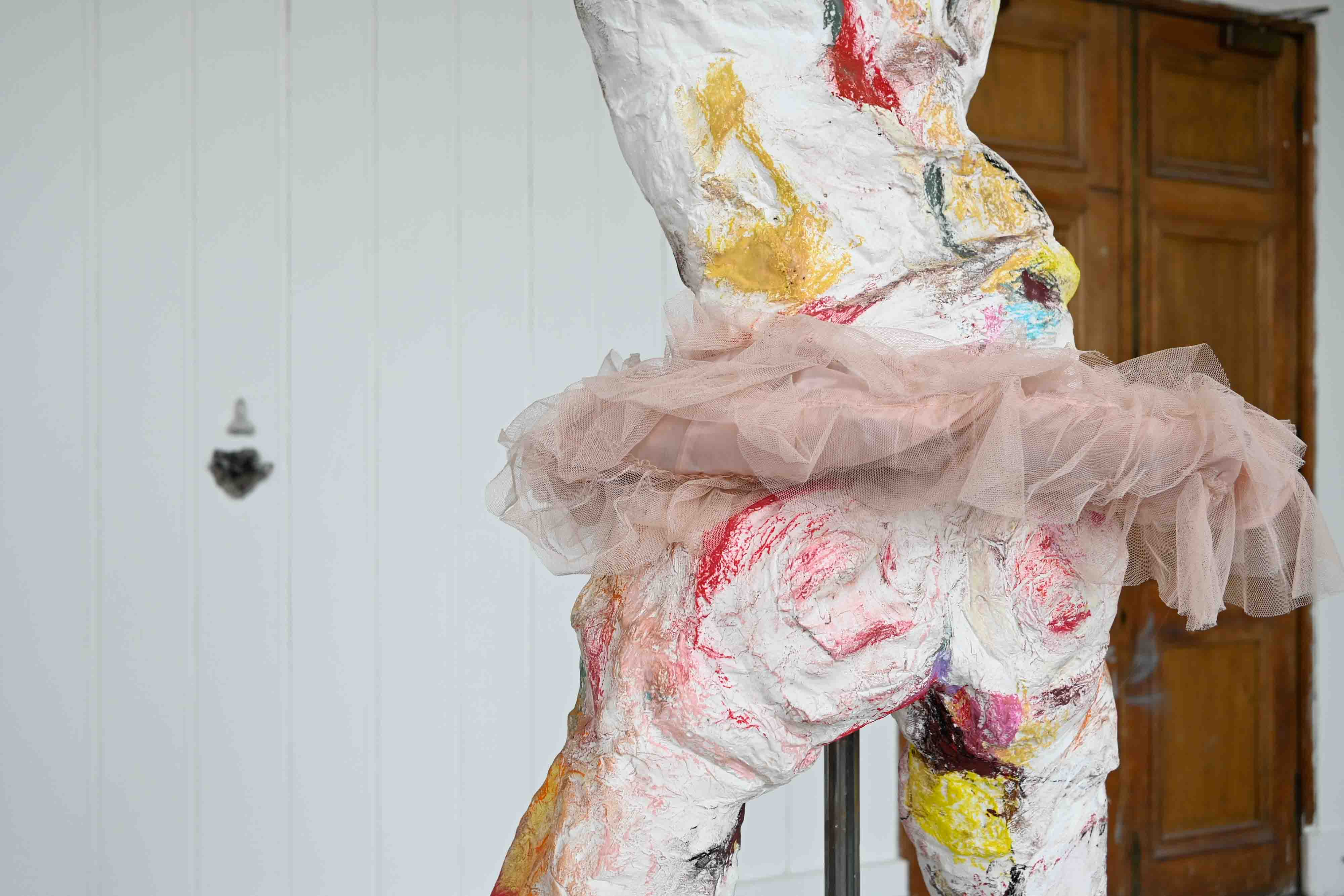 Erin Ridgway, Nipples Like Raisins, Bum Like a Belgian Bun, 2026, plaster, chalk, tulle, pewter, metal, 2,700mm x 490mm, Edinburgh.