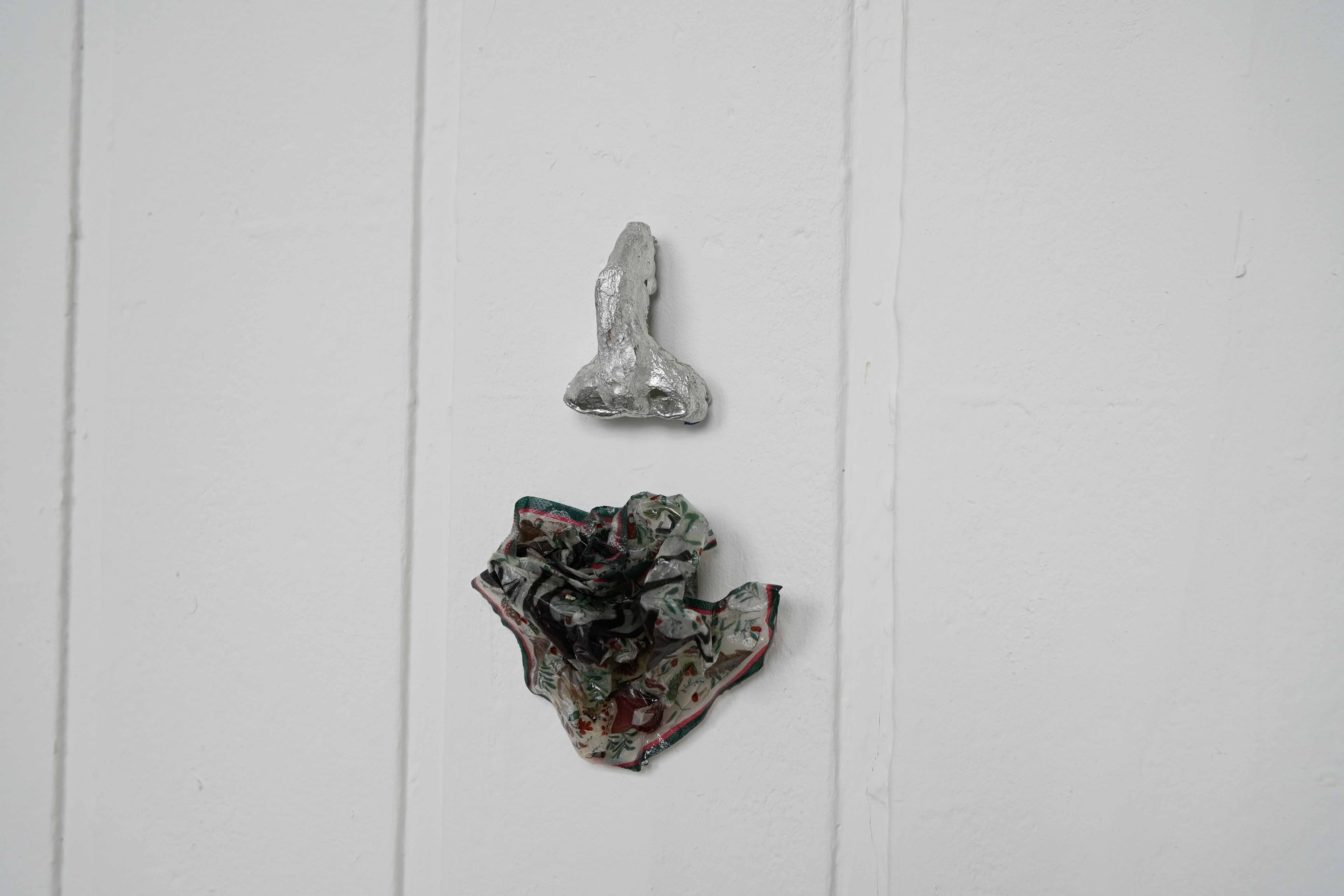Erin Ridgway, Nipples Like Raisins, Bum Like a Belgian Bun, 2026, plaster, chalk, tulle, pewter, metal, 2,700mm x 490mm, Edinburgh.