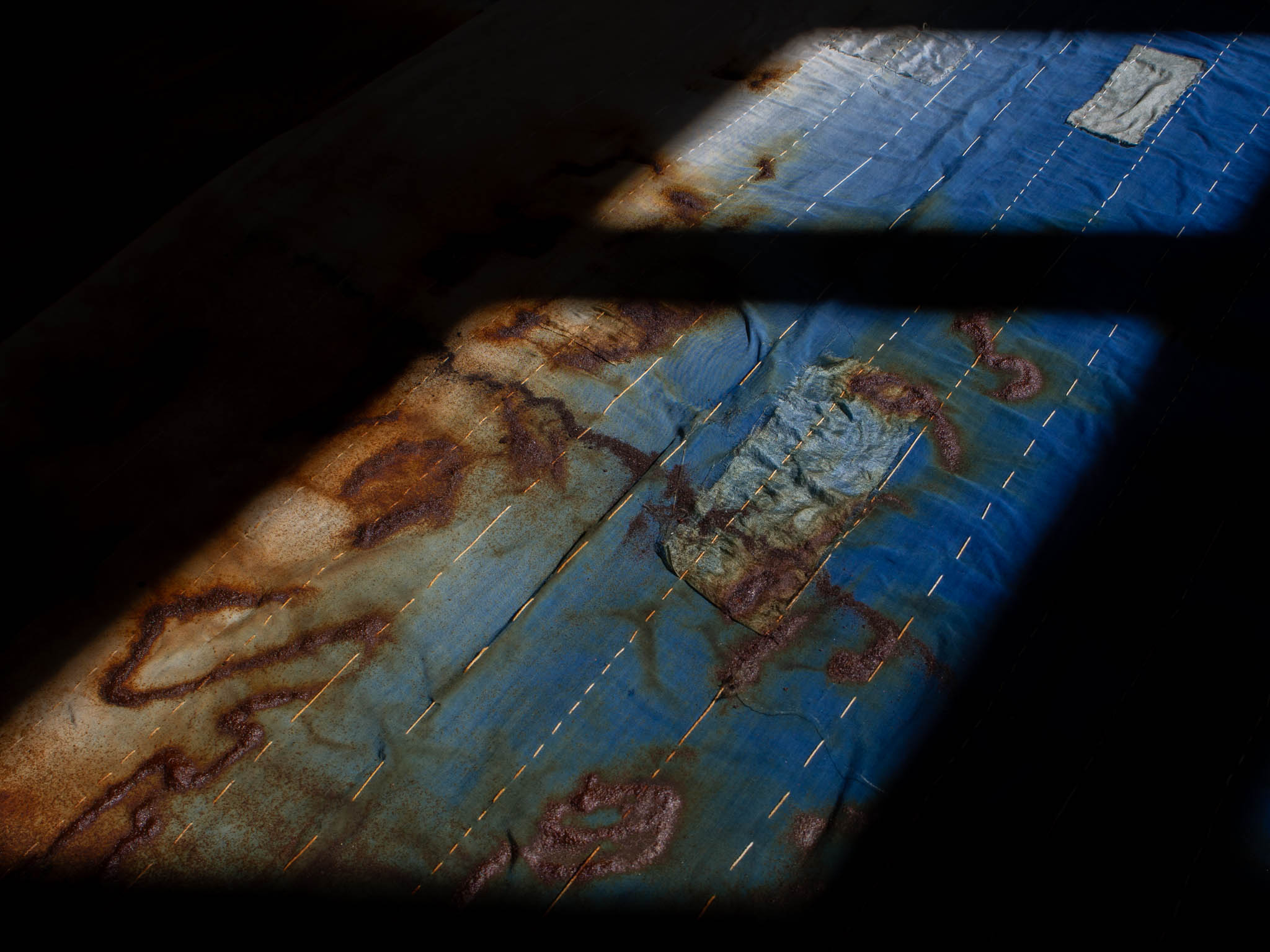 Indigo and rust dyed fabric