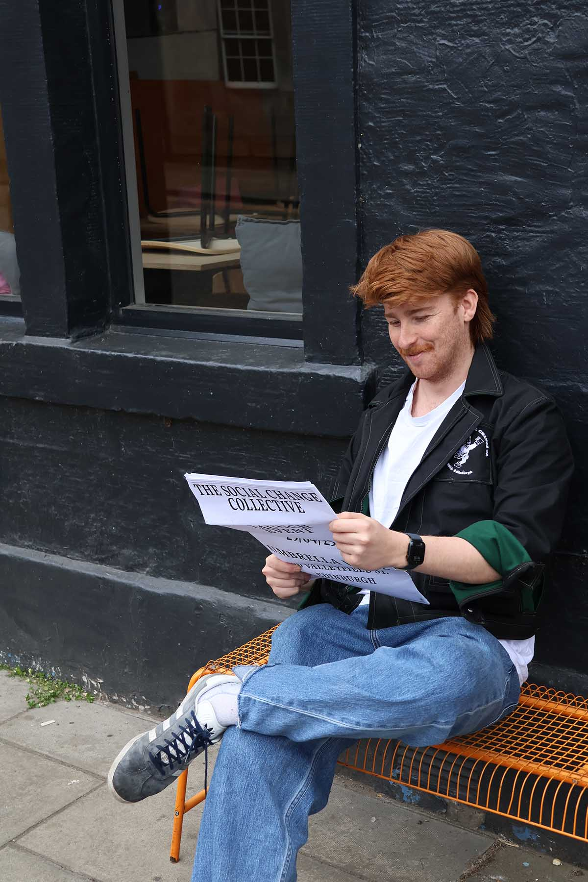 Wearer reading newspaper