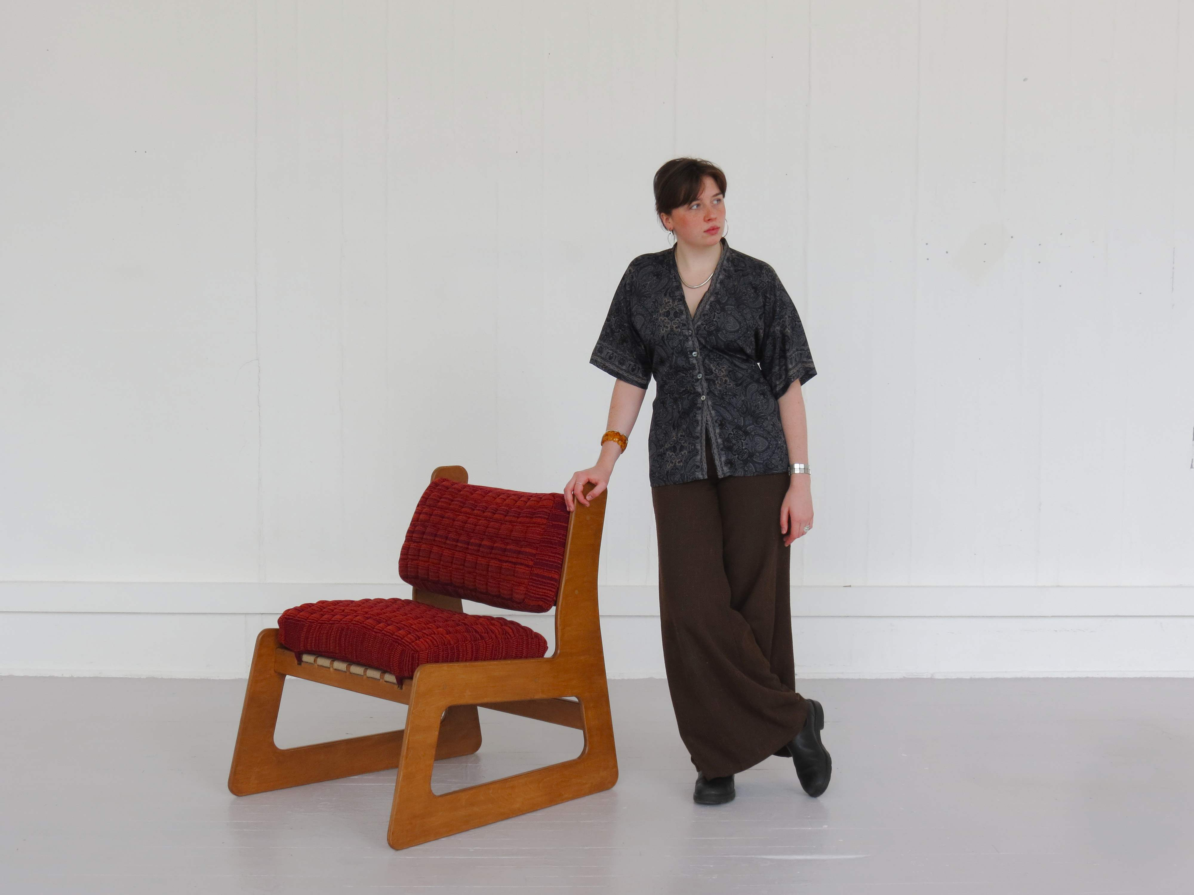 Katy Pilling standing with chair