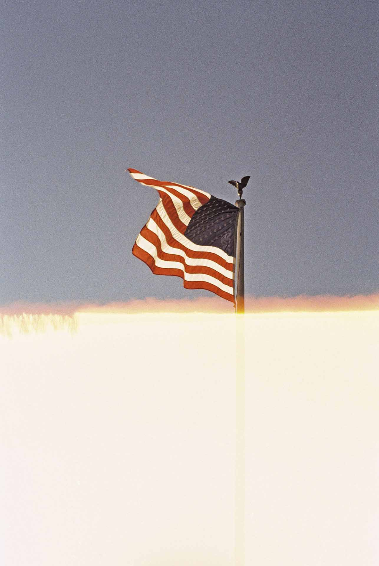 A backwards American flag. The processig of the film made an error that cut off half the frame,making it seem as if the flag is on fire.