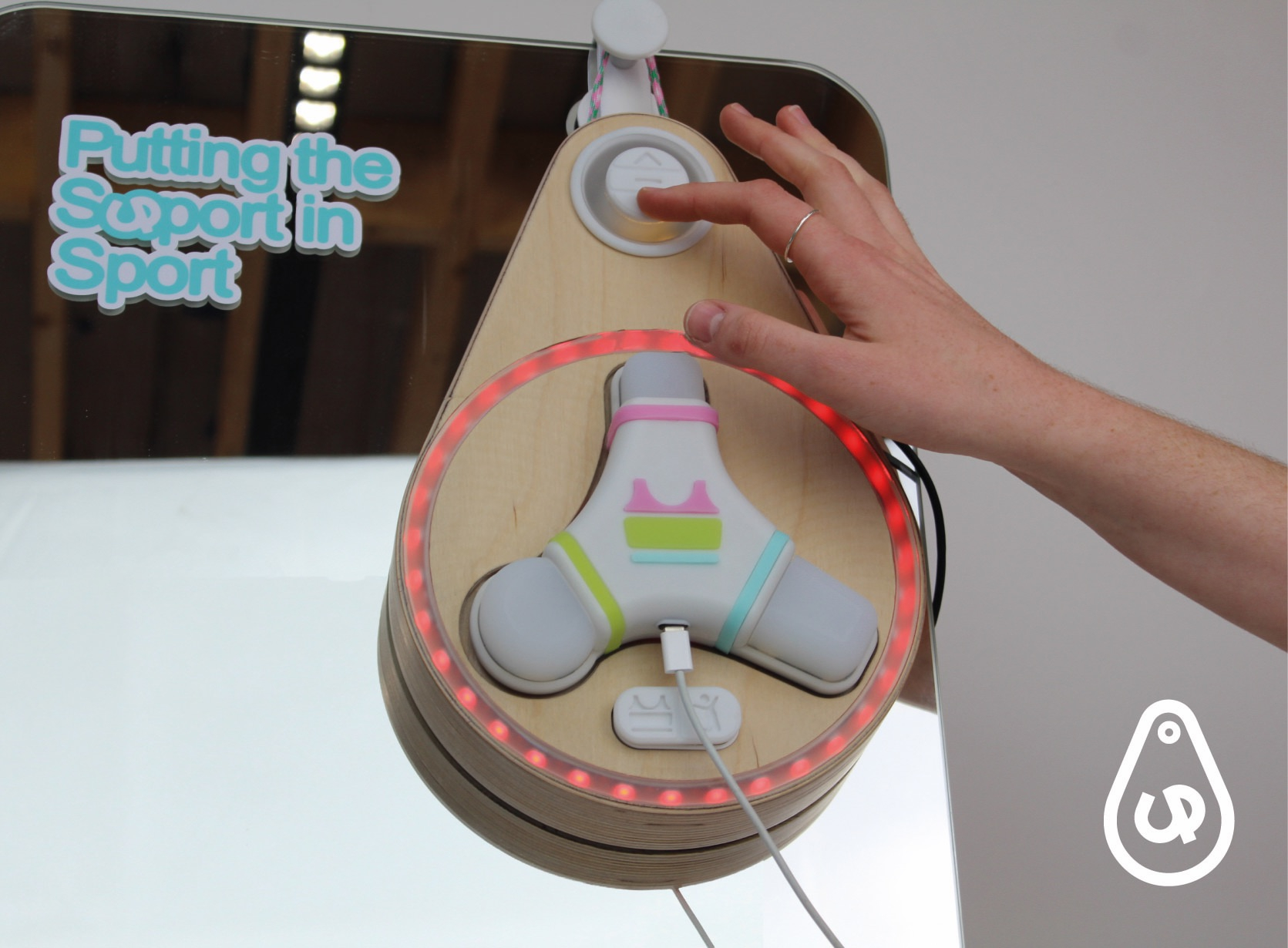 A user pressing the support button of the UP dock