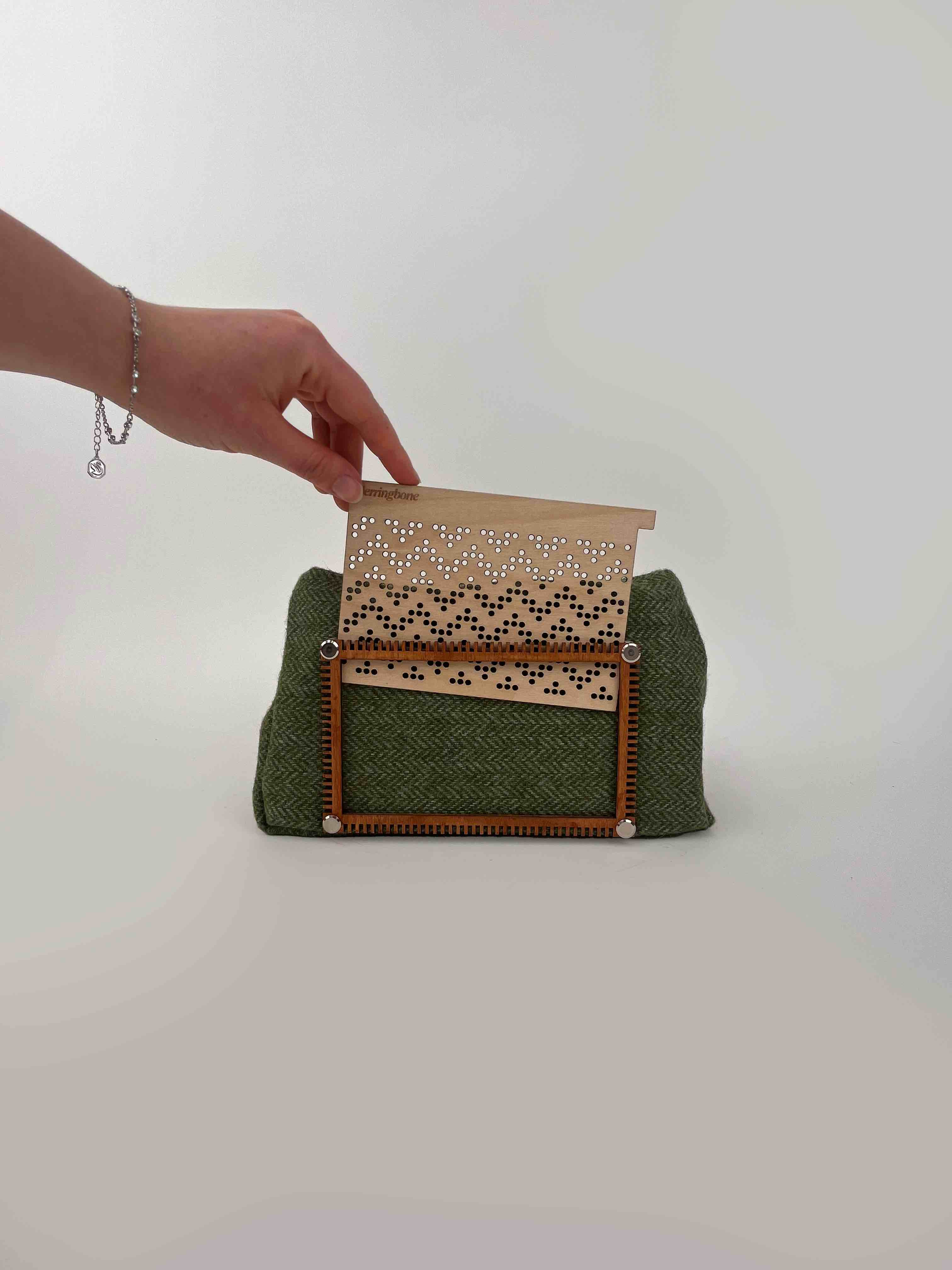 Image of hand lifting the draft card component of LOOM-inate