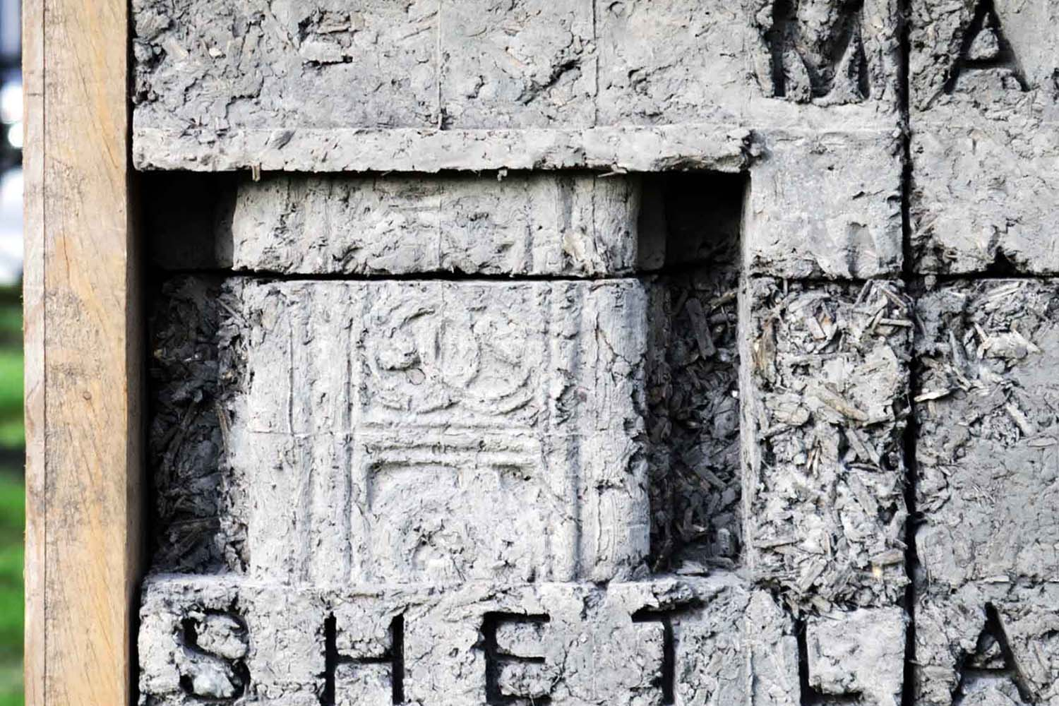 Detail of ornamental bricks developed to commemorate species at risk of extinction in Scotland.